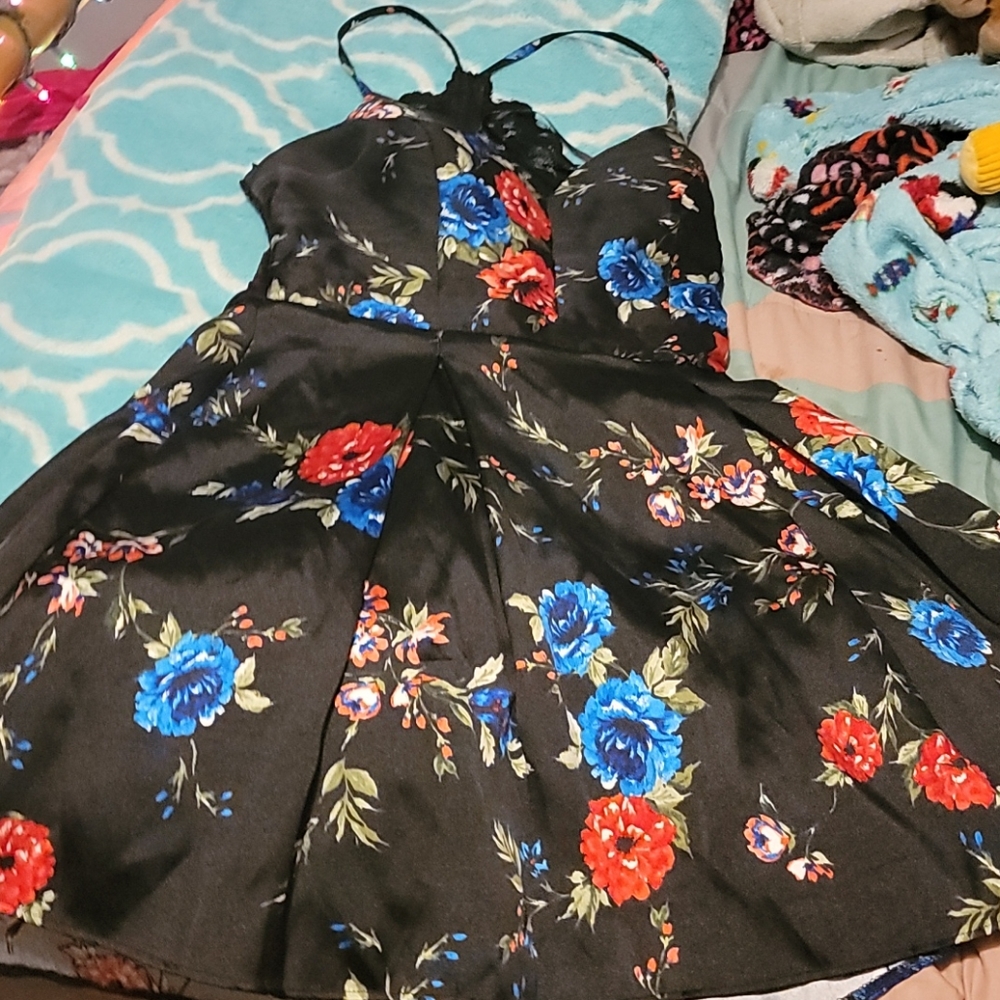 Black dress with red and blue flowers.